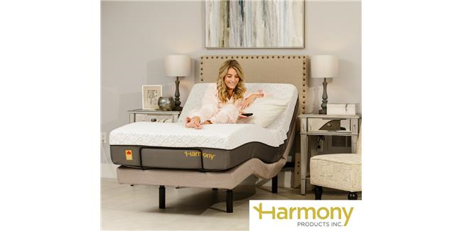 Image of woman using adjustable bed.