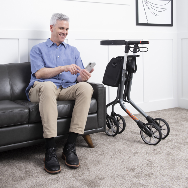 older gentlemen on couch with Lets Move Rollator