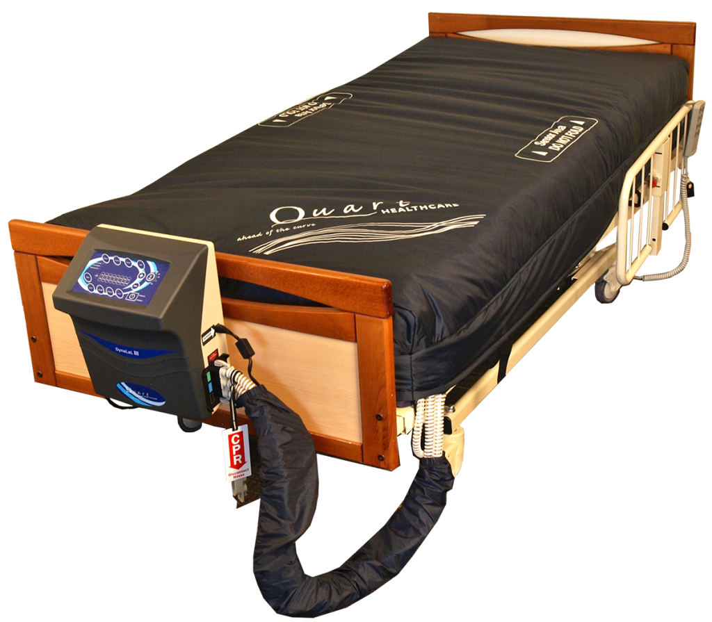 The Quart DynaLAL III Low Air Loss Mattress on a bed connected to its air pump.