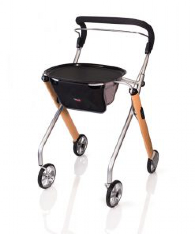 The Let's Go Indoor Rollator at an angle, in the beech colour. It's shows with the removable tray.