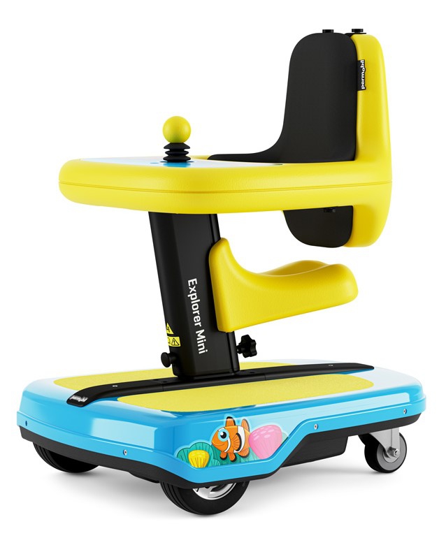 The Permobil Explorer Mini, a pediatric power mobility device, is shown at an angle. It's bright yellow and turquoise with fish sticker decorations.