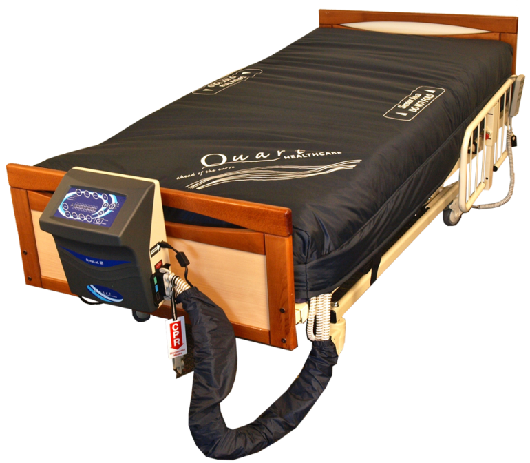 The Quart DynaLAL III Low Air Loss Mattress on a bed connected to its air pump.