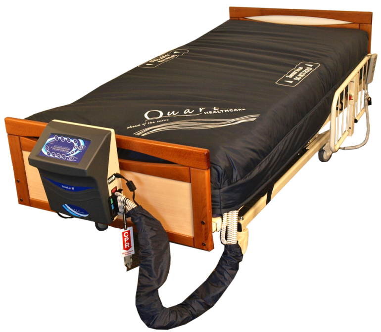 The Quart DynaLAL III Low Air Loss Mattress on a bed connected to its air pump.