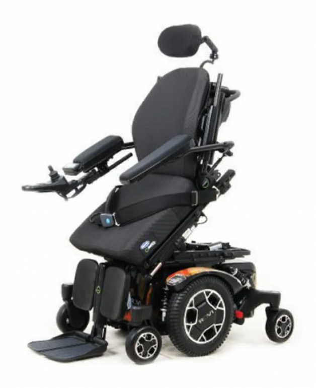 The ROVI A3 power wheelchair with multi-coloured trim is shown in the forward reaching position which assists in reaching objects and surfaces that were previously difficult to reach.