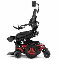 The Permobil M3 Corpus power chair with red accents is shown in the ActiveReach position - 12 inches of seat elevation combined with 20 degrees of forward tilt