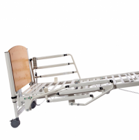 The 8199 Home Care Bed is shown from the side with half rails, in Trendelenburg (feet up) position. thumbnail