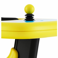 A closeup of the Permobil Explorer Mini joystick. It is a large yellow ball with a black accordion-style cover for the stem. thumbnail