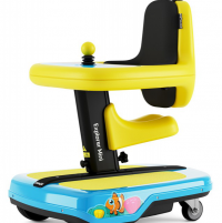 The Permobil Explorer Mini, a pediatric power mobility device, is shown at an angle. It's bright yellow and turquoise with fish sticker decorations. thumbnail