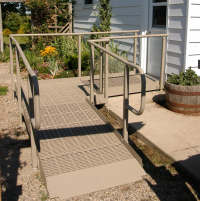 QRamp with a 90 degree bend installed leading to a white house. thumbnail